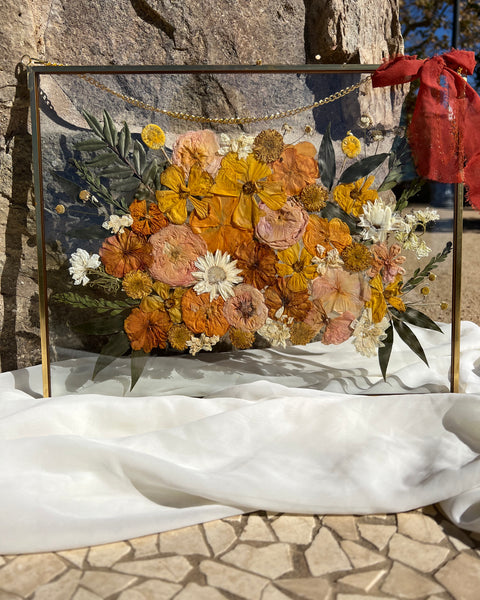 11x14 brass hanging pressed flower frame featuring preserved yellow-themed wedding blooms, handcrafted by Happihome for timeless floral wall décor.