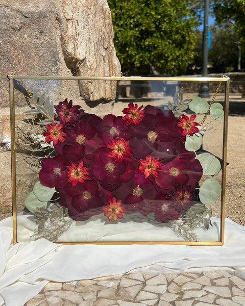 11x14 brass hanging pressed flower frame featuring preserved red-themed wedding blooms, handcrafted by Happihome for timeless floral wall décor.